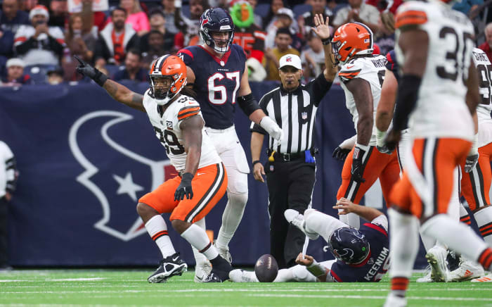 Dec 24, 2023; Houston, Texas, USA; Cleveland Browns defensive end Za'Darius Smith (99) celebrates after sacking Houston Texans quarterback Case Keenum (18) during the second quarter at NRG Stadium. Mandatory Credit: Troy Taormina-USA TODAY Sports